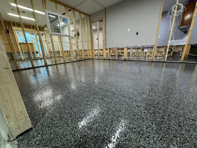 Decorative metallic epoxy floor with custom pigment and gloss finish